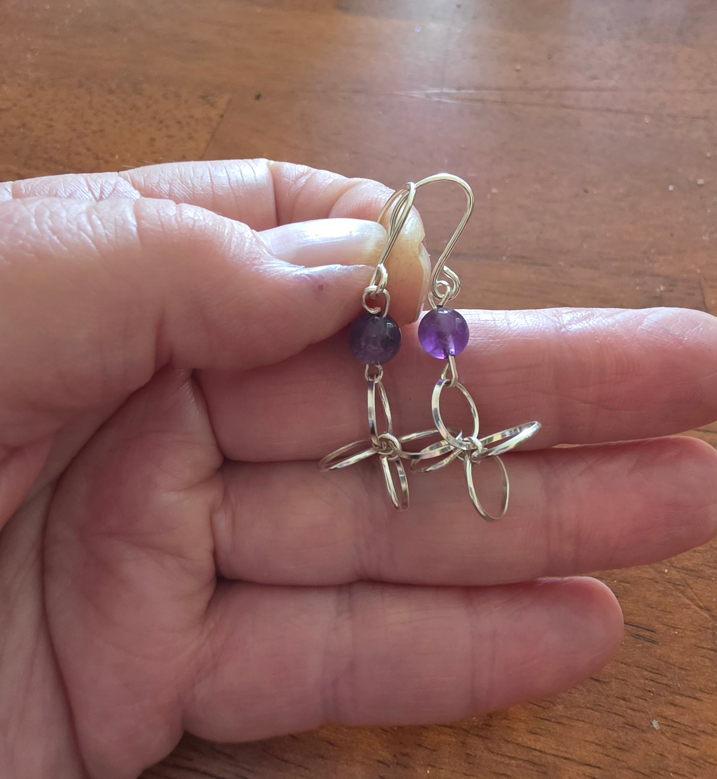 Silver earrings with amethyst bead